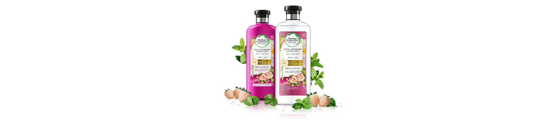 Bottles of Herbal Essences Shampoo & Conditioner White Strawberry & Sweet Mint Collection