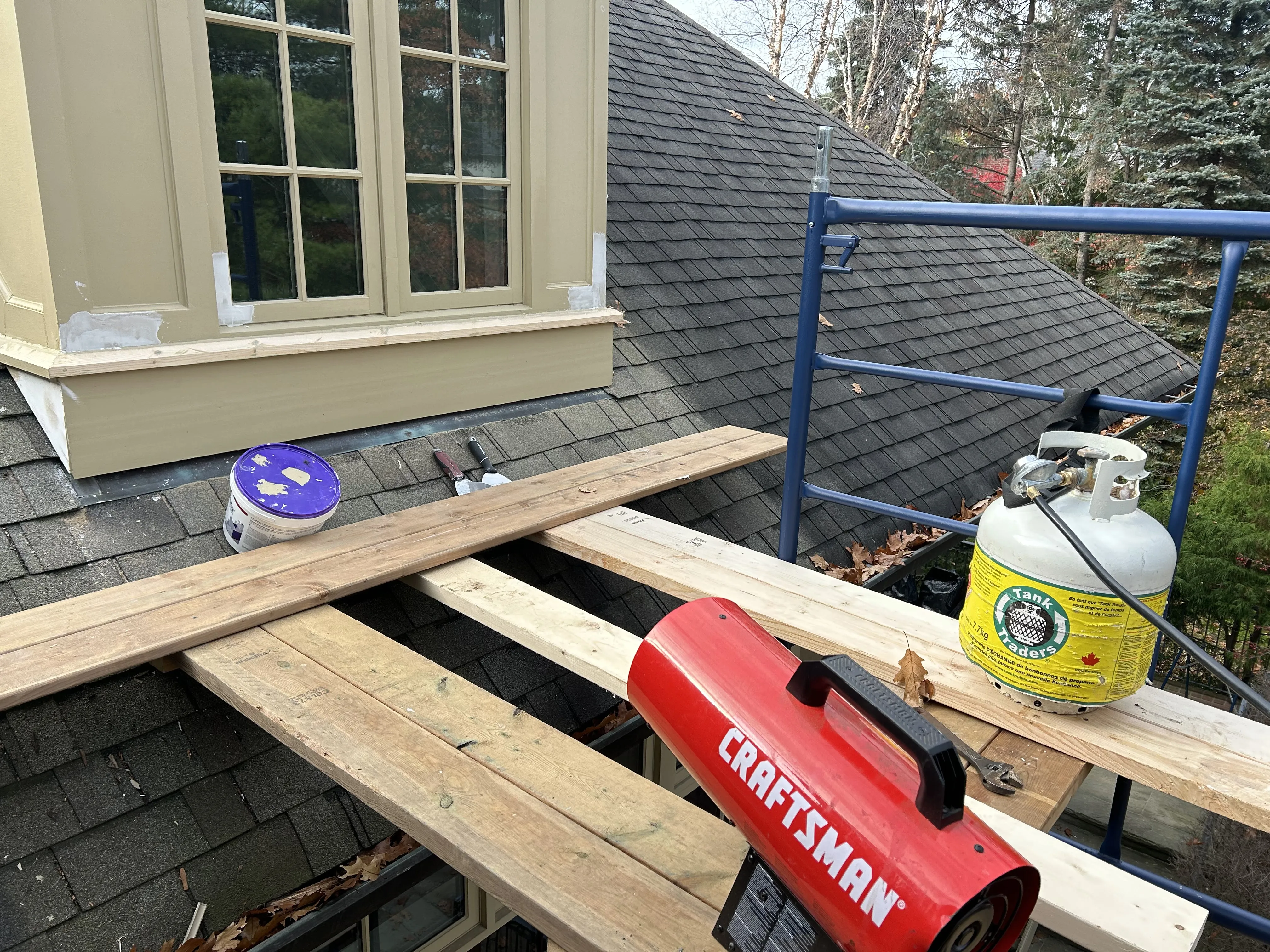 Exterior deck repair and wood restoration completed in Burlington including board replacement and staining.