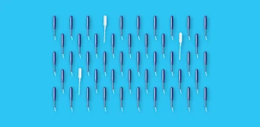 A group of tampons on a blue background.