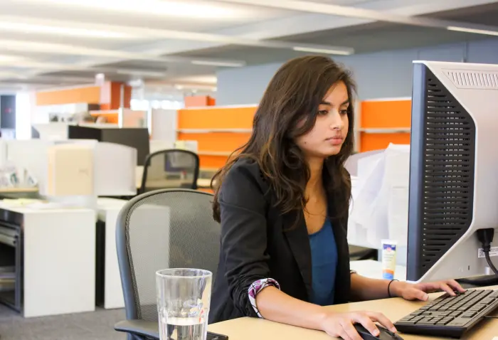 student working at her desk