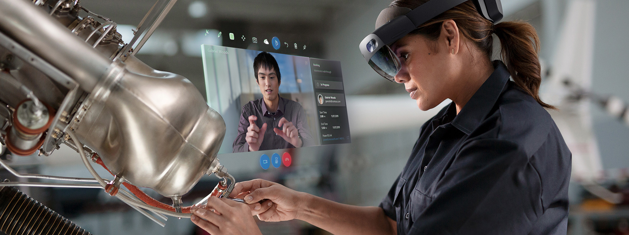 A worker wearing a HoloLens 2 headset