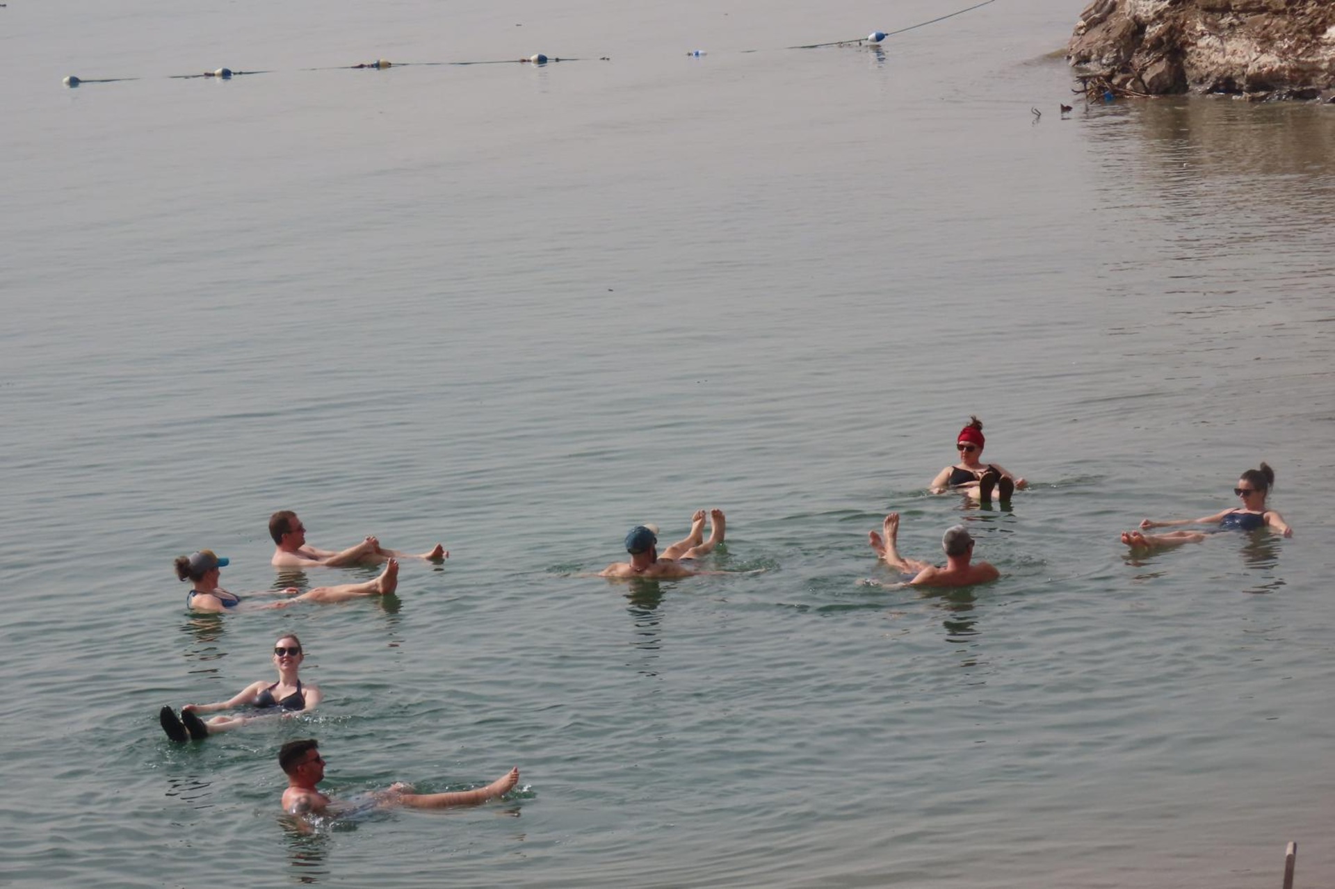 Dead Sea in Jordan Lydia Paleschi - A group of travellers floating in the Dead Sea in Jordan.