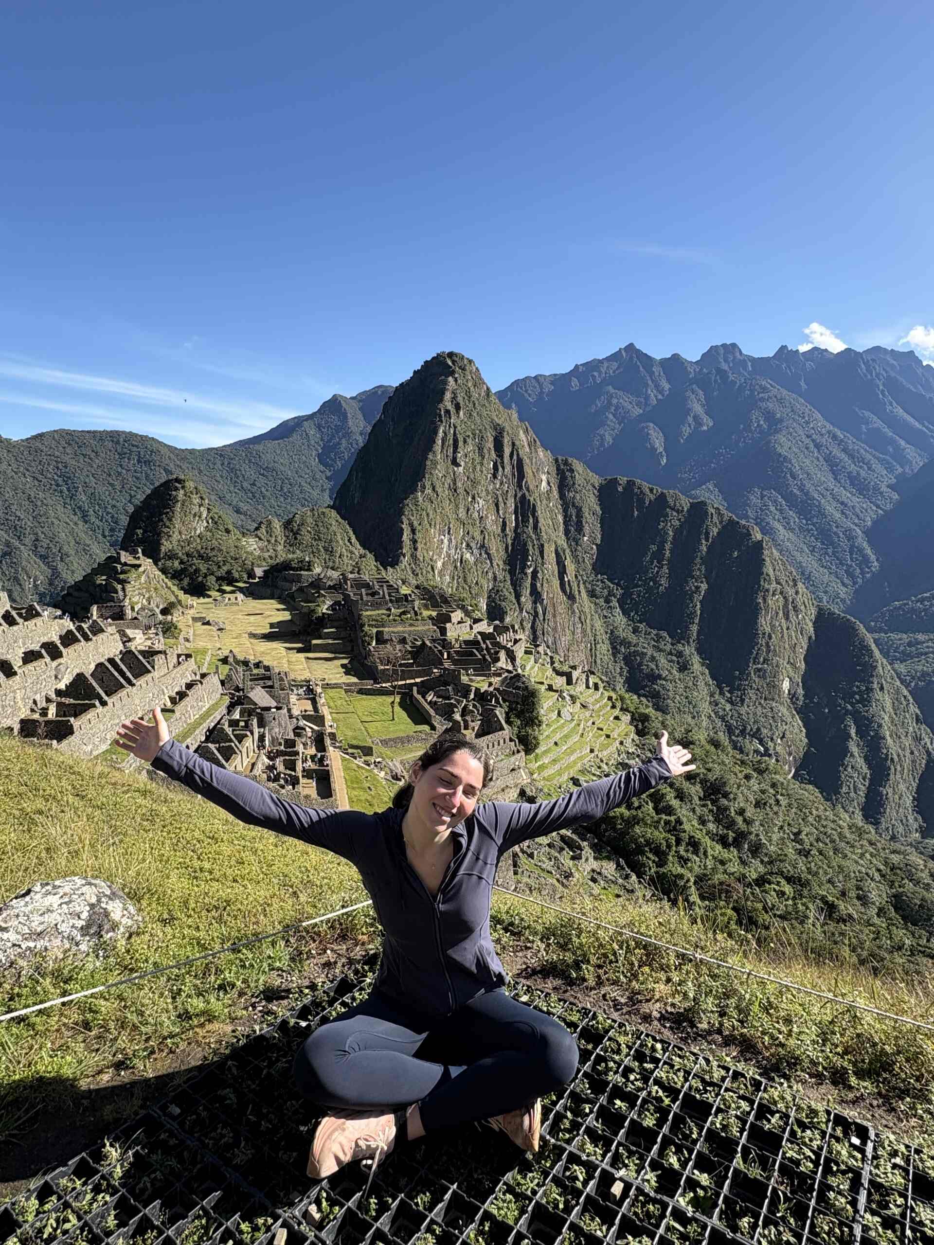 Image - Traveller Ally at Machu Picchu 20-year-old Canadian traveller Ally posing for a photograph in front of Machu Picchu in Peru.