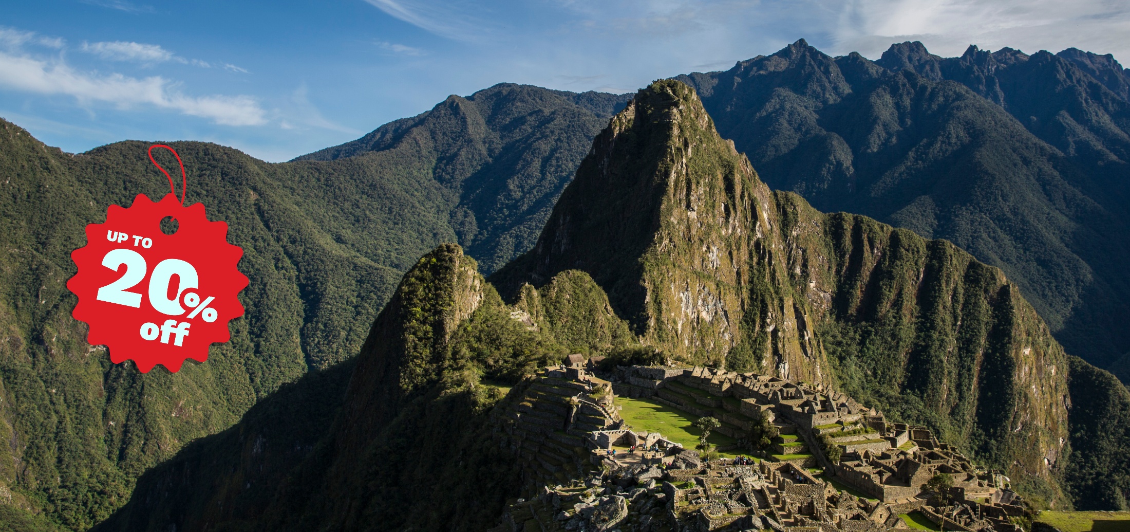Machu Picchu ruins with green mountains under blue sky, featuring a red sale tag showing up to 20% off.
