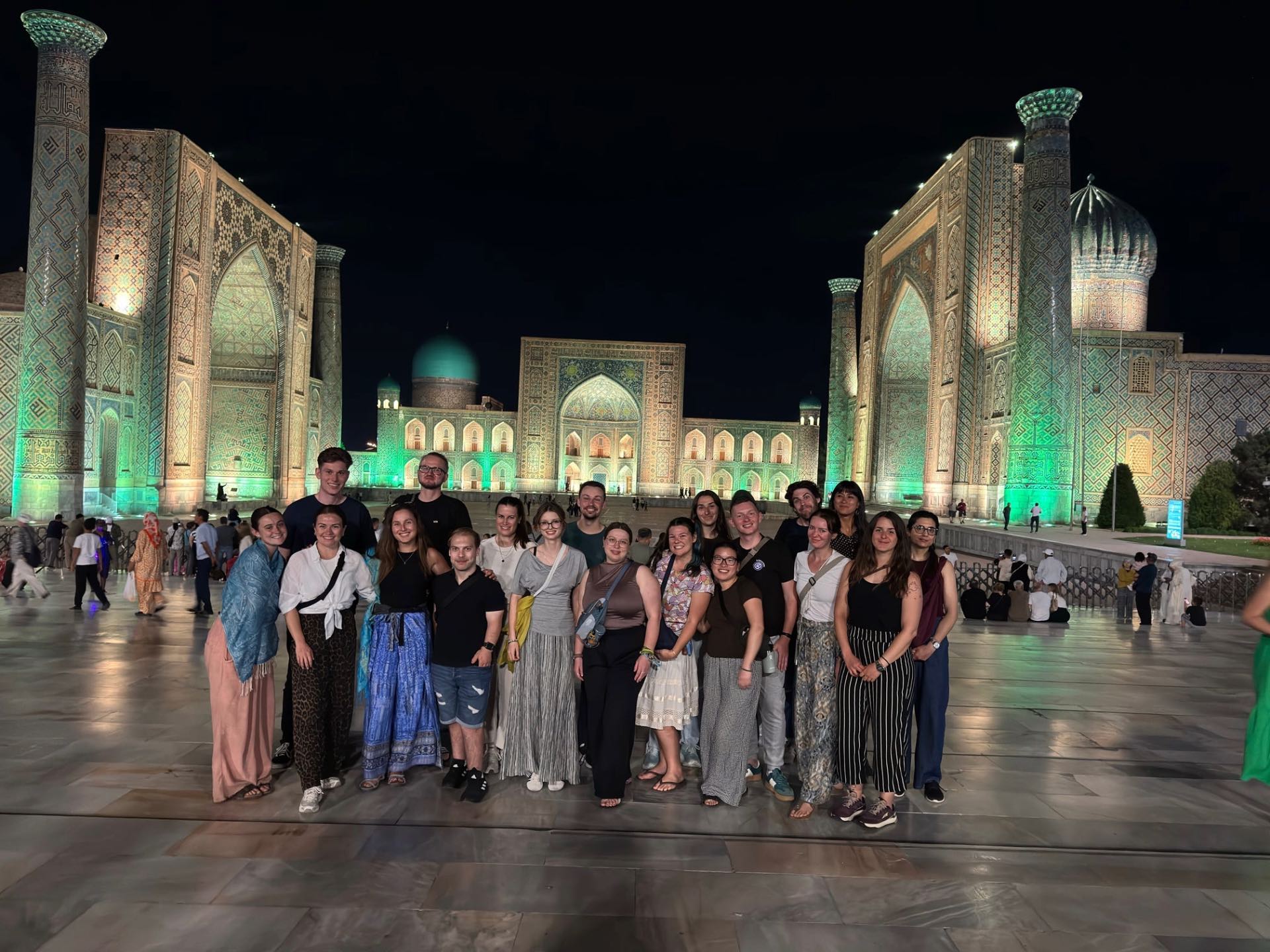 Image - Ally and a group of travellers in front of a mosque Traveller Ally and a group of travellers in front of an exquisite mosque.
