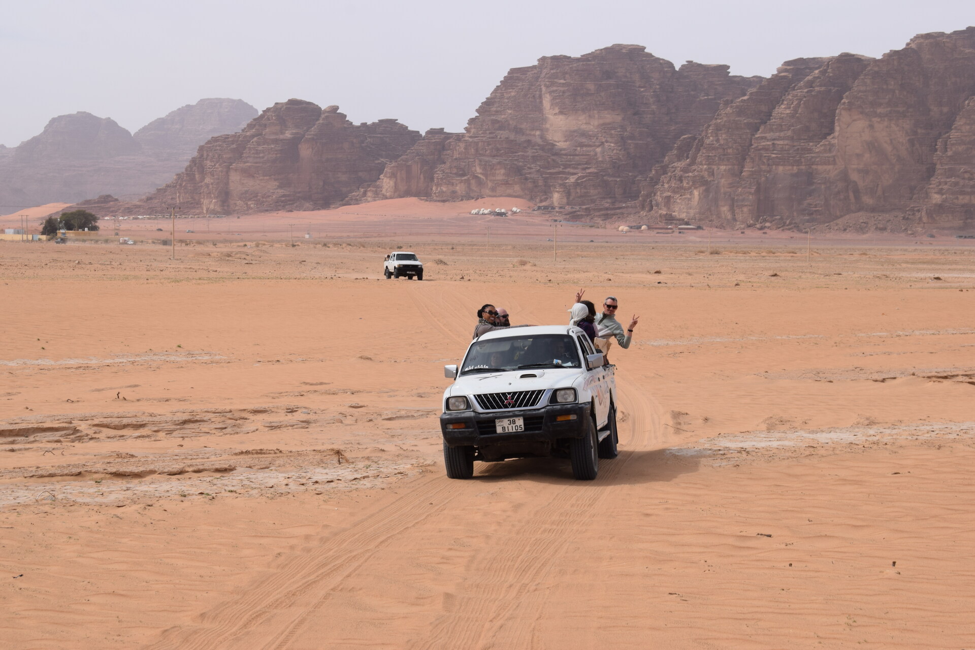 Desert in Jordan Lydia Paleschi - Two 4x4s driving through the desert in Jordan on a G Adventures tour.