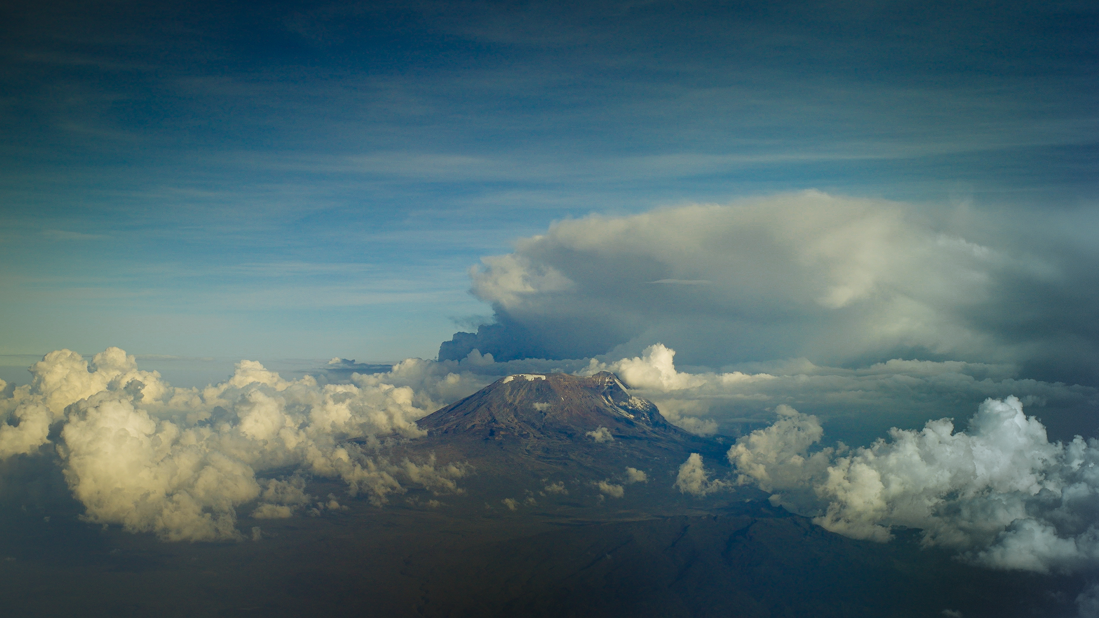 2 Kilimanjaro from the air. The summit sits at 5,895 metres, high enough to have its own weather systems. (Credit: Mark Klassen)