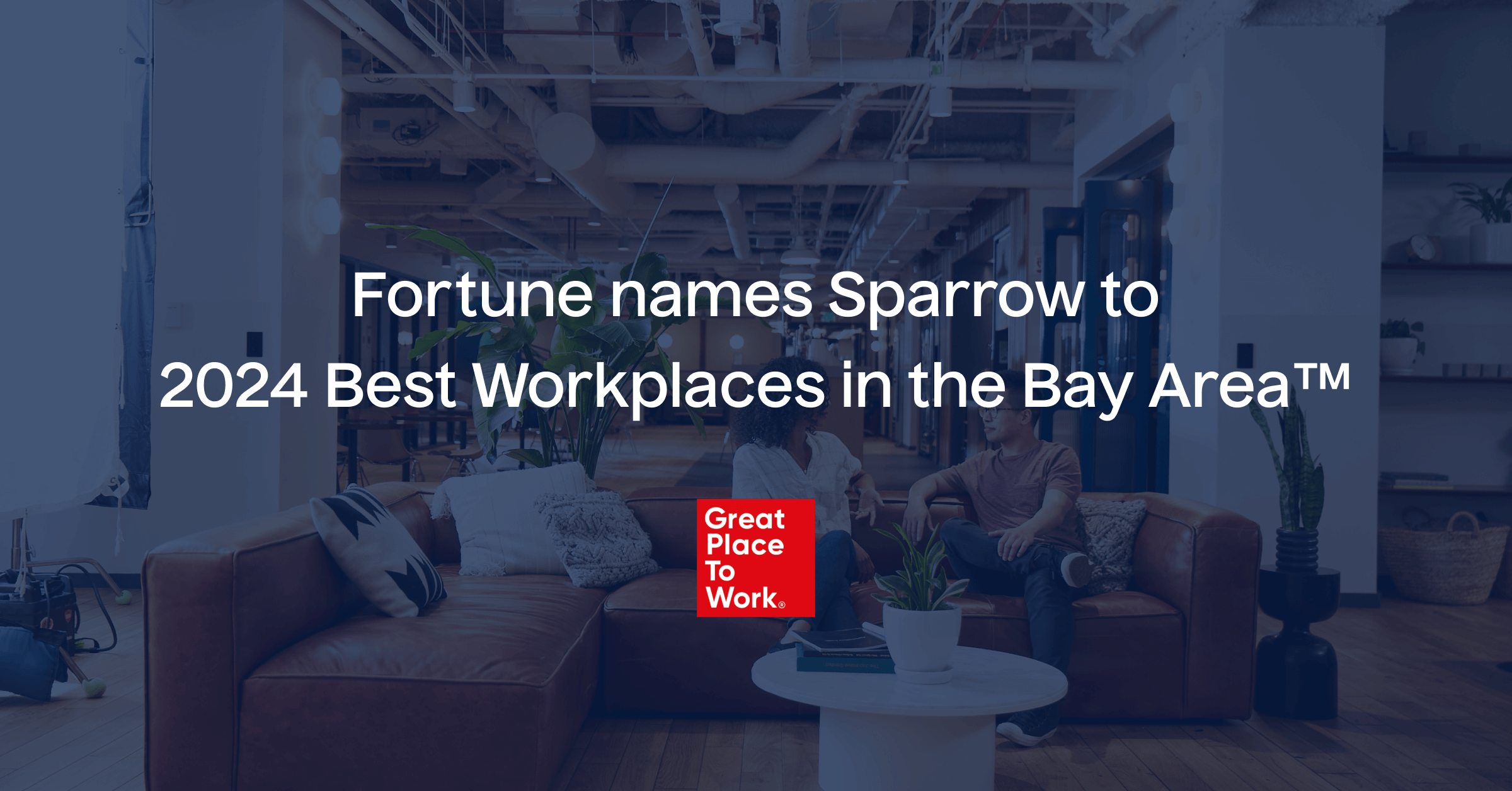 An office setting with two people sitting on a couch in the background. The text reads: "Fortune names Sparrow to 2024 Best Workplaces in the Bay Area™." A red badge at the center bottom reads: "Great Place to Work" highlighting Sparrow's recognition for exceptional employee experience.
