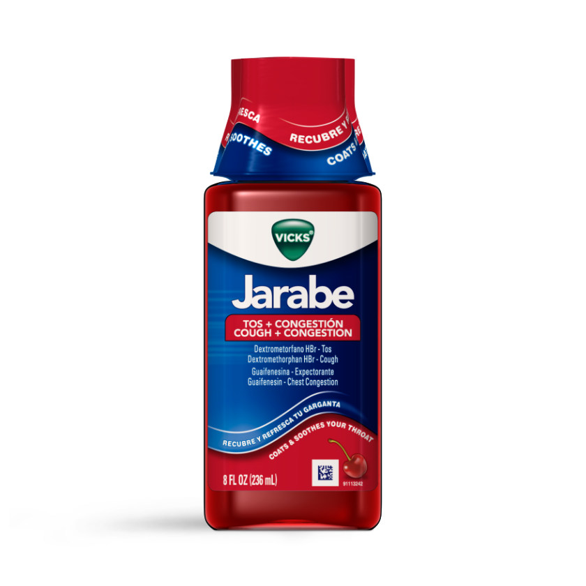 Vicks Jarabe cough and congestion syrup bottle with red cap and blue label, 8 fl oz, cherry flavored medication.