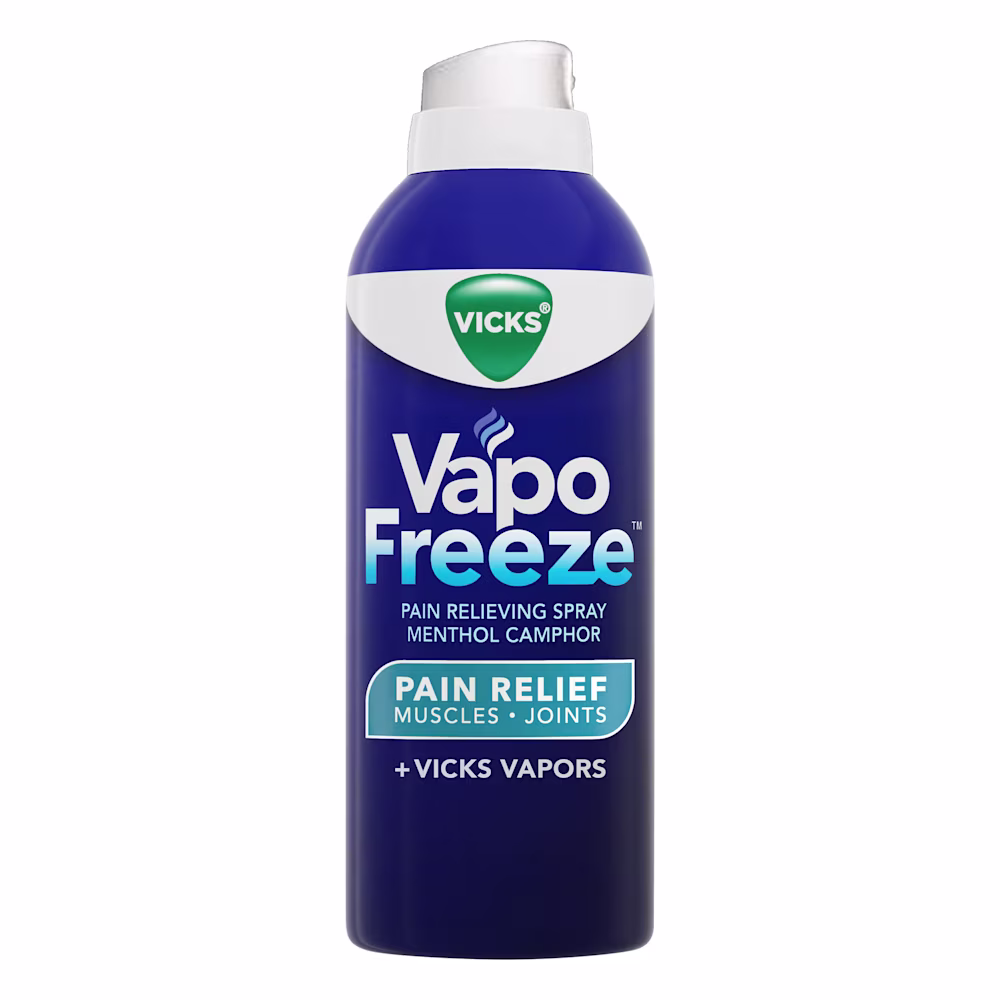 Blue Vicks VapoFreeze spray can for muscle and joint pain relief containing menthol camphor and Vicks vapors.