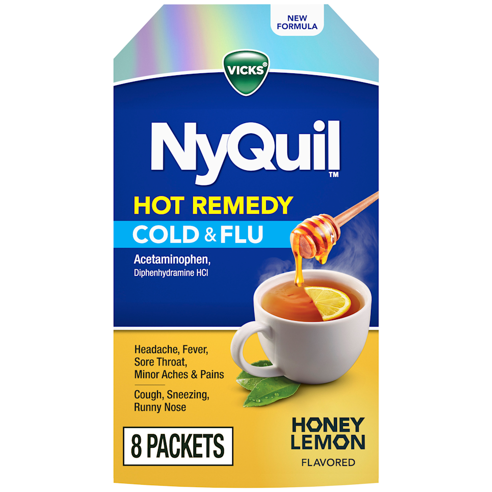 Vicks NyQuil Hot Remedy Cold & Flu medicine box showing honey lemon flavor, 8 packets, with image of steaming tea cup.