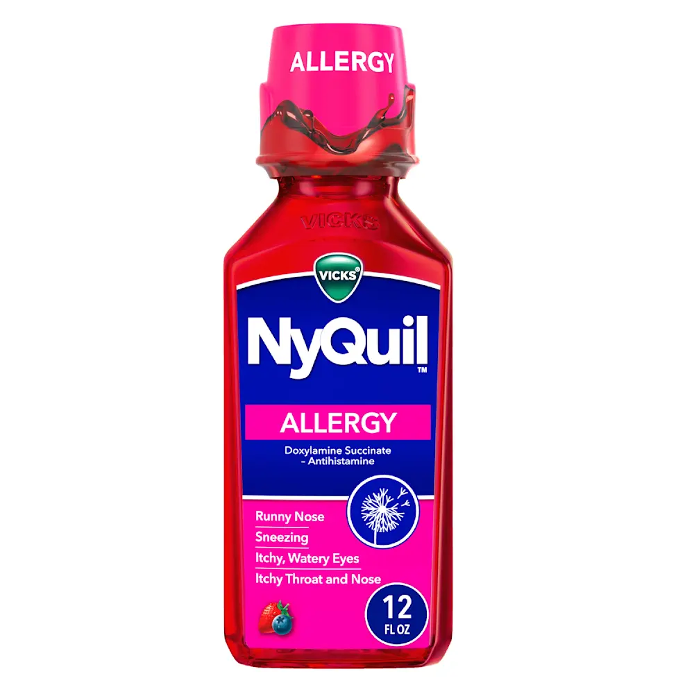 Bottle of Vicks NyQuil Allergy liquid medication with pink cap and label for treating runny nose and sneezing symptoms.
