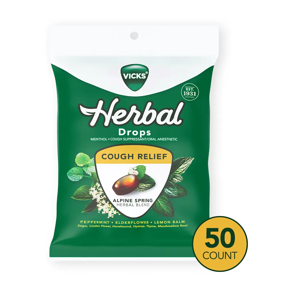 Vicks Herbal Drops package for cough relief featuring Alpine Spring blend with menthol and herbs, 50 count bag.
