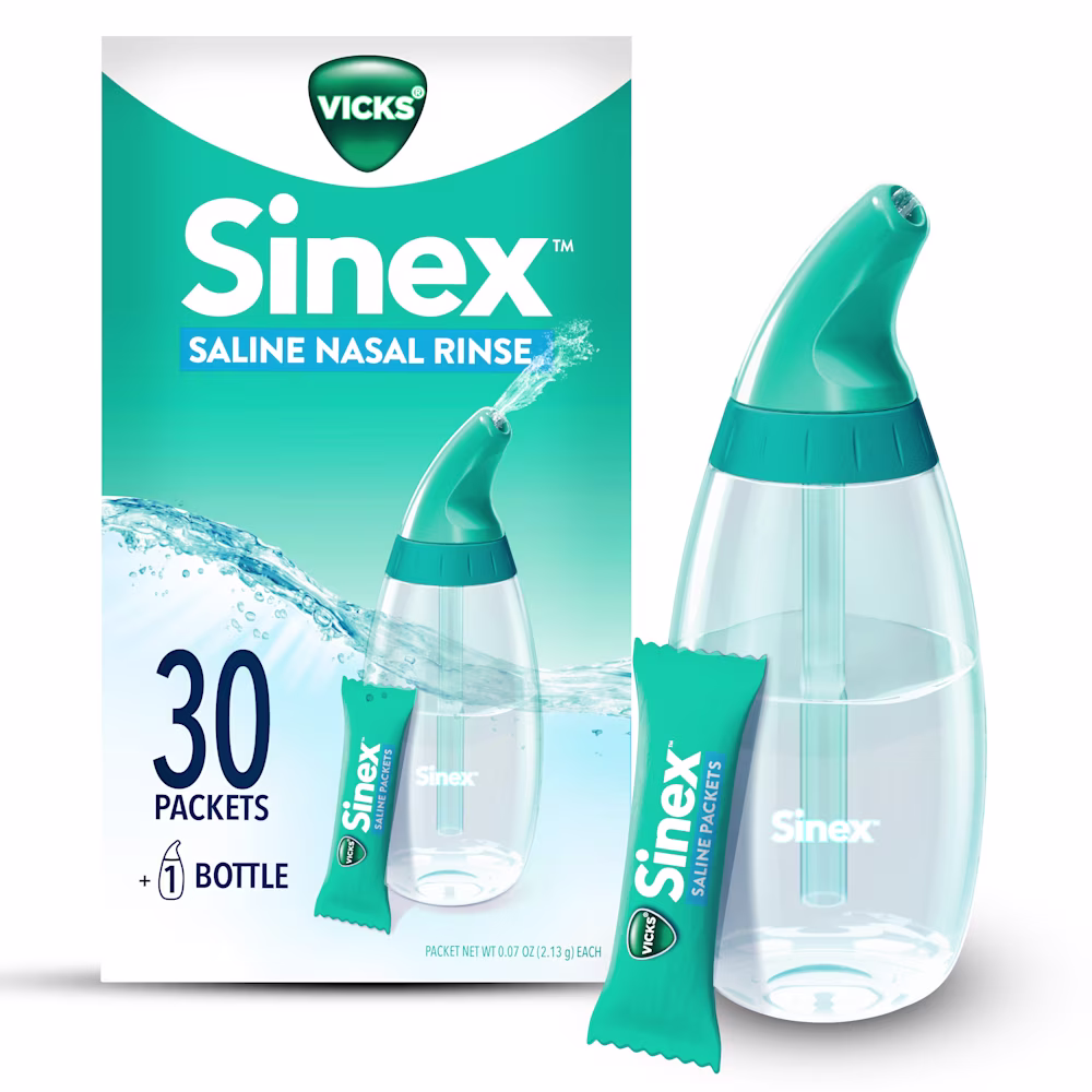 Package of Vicks Sinex Saline Nasal Rinse Kit, a Vicks saline packet and a spray bottle.