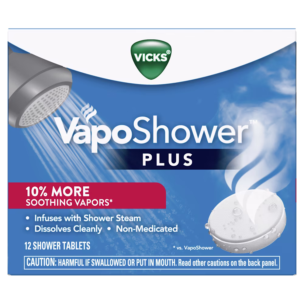 Vicks VapoShower Plus box featuring shower tablets that release soothing vapors with shower steam, contains 12 tablets.