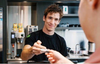 Man receiving money from a customer