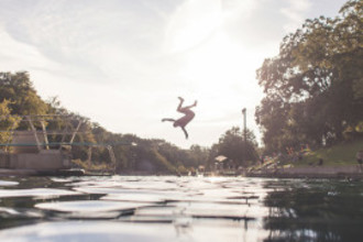 Artwork - Jennifer Sathngham - Silhouetted Man Jumping off Diving Board at Barton Springs