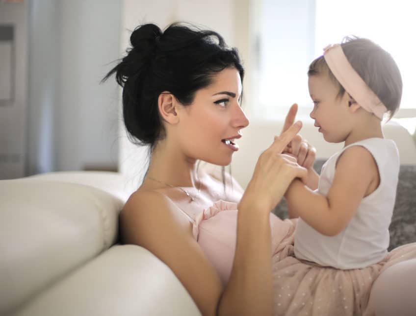 baby and mom talking