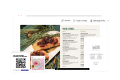 Digital menu in a flipbook format showing salmon steaks next to a social post and QR code