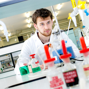 Student working in pharmacy lab with science equipment Student working in pharmacy lab with science equipment
