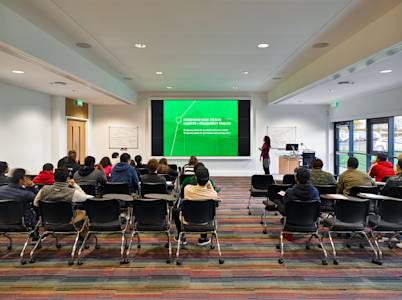 View of INTO Centre lecture hall with a class taking place View of INTO Centre lecture hall with a class taking place