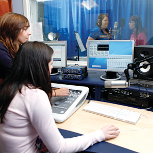 INTO Students working in a sound studio INTO Students working in a sound studio