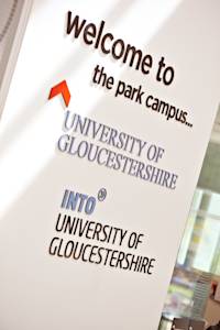 Welcome sign for INTO Centre in the University campus Welcome sign for INTO Centre in the University campus