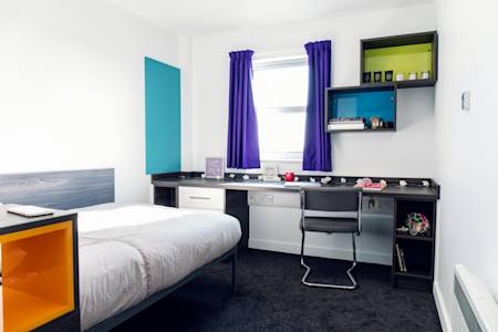 View of INTO Manchester Liberty Point en suite room with bed and desk View of INTO Manchester Liberty Point en suite room with bed and desk