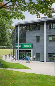View of main entrance to the INTO Centre with international students outside View of main entrance to the INTO Centre with international students outside