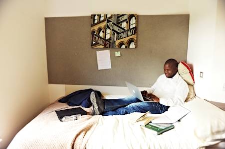Student studying in room in Beech Court University of Stirling Student studying in room in Beech Court University of Stirling