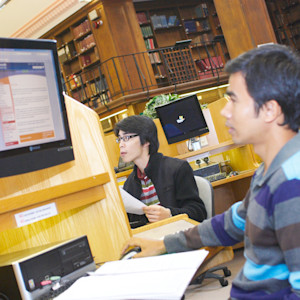Students working on computer in Newcastle University Old Library Building Students working on computer in Newcastle University Old Library Building