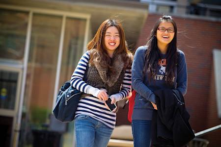International students walking together on campus International students walking together on campus