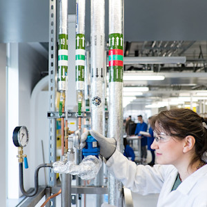 INTO international student using chemical engineering equipment INTO international student using chemical engineering equipment