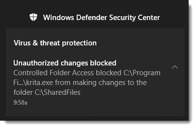 Pops up as a helpful notification, alerting me to the unauthorized changes it blocked on my behalf.