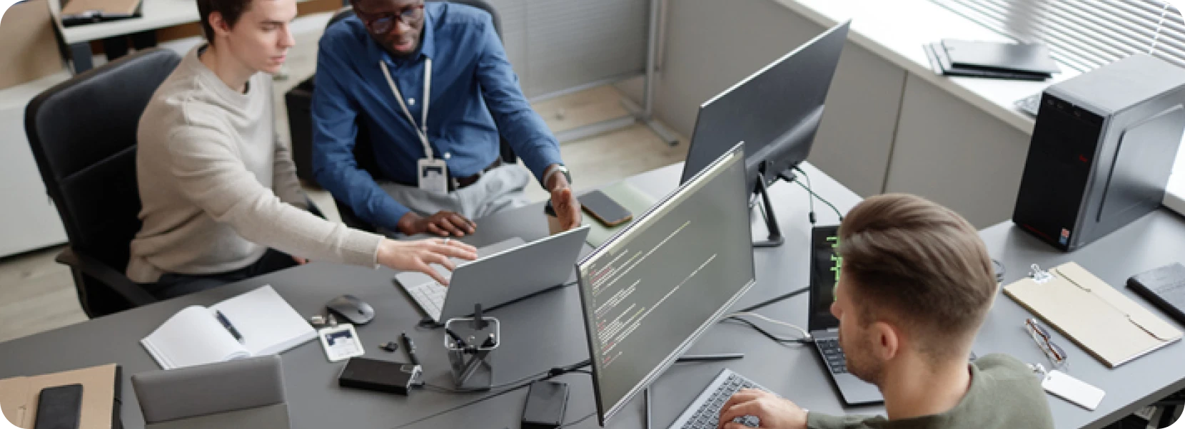 people working around computers