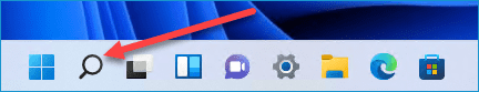 Red arrow pointing to the search icon on the Windows 11 taskbar.