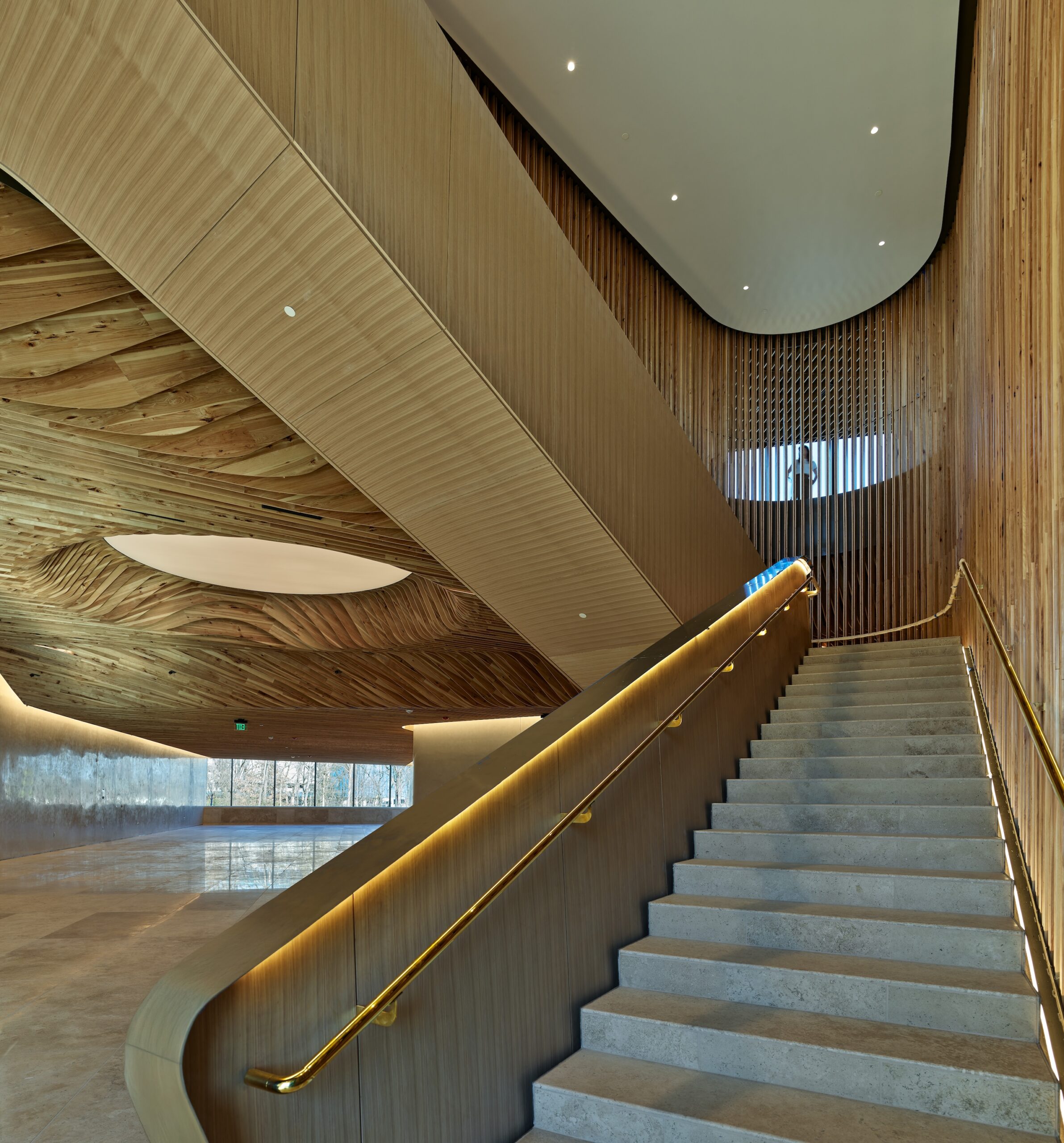 Interior view of the central staircase inside the Heartland Whole Health Institute