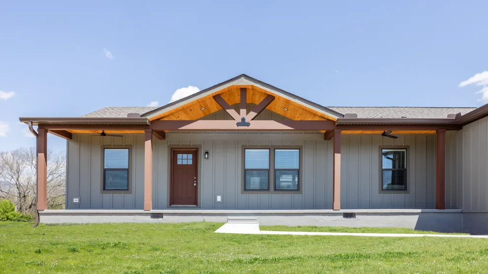 Extend your living space outdoors with a beautiful site-built porch, creating an inviting atmosphere where you can enjoy spending time with friends and family.