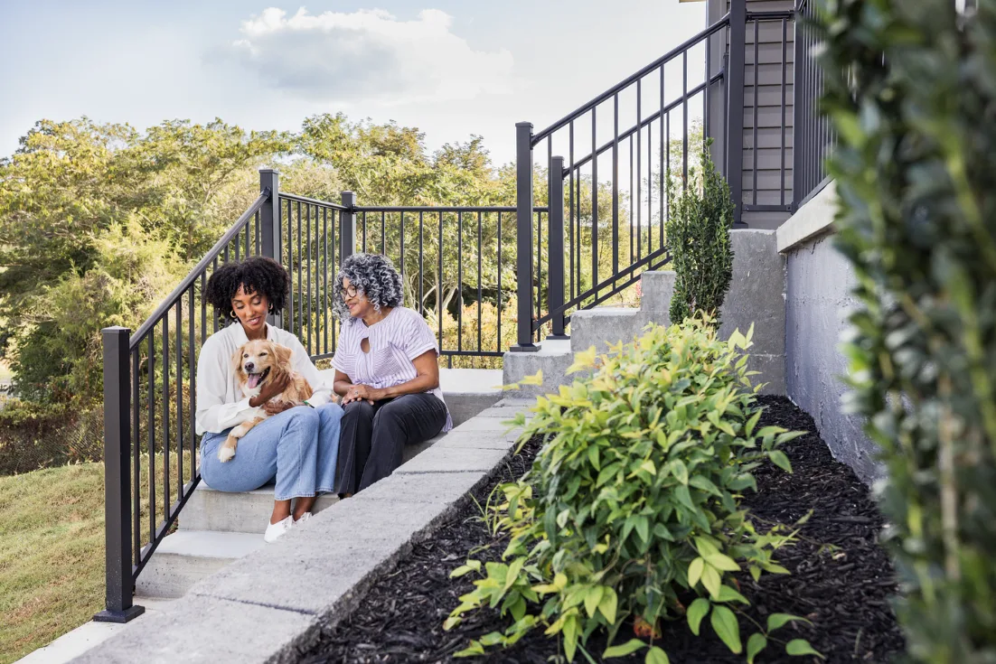 A mother and daughter duo discuss their financial readiness outside of their new home.