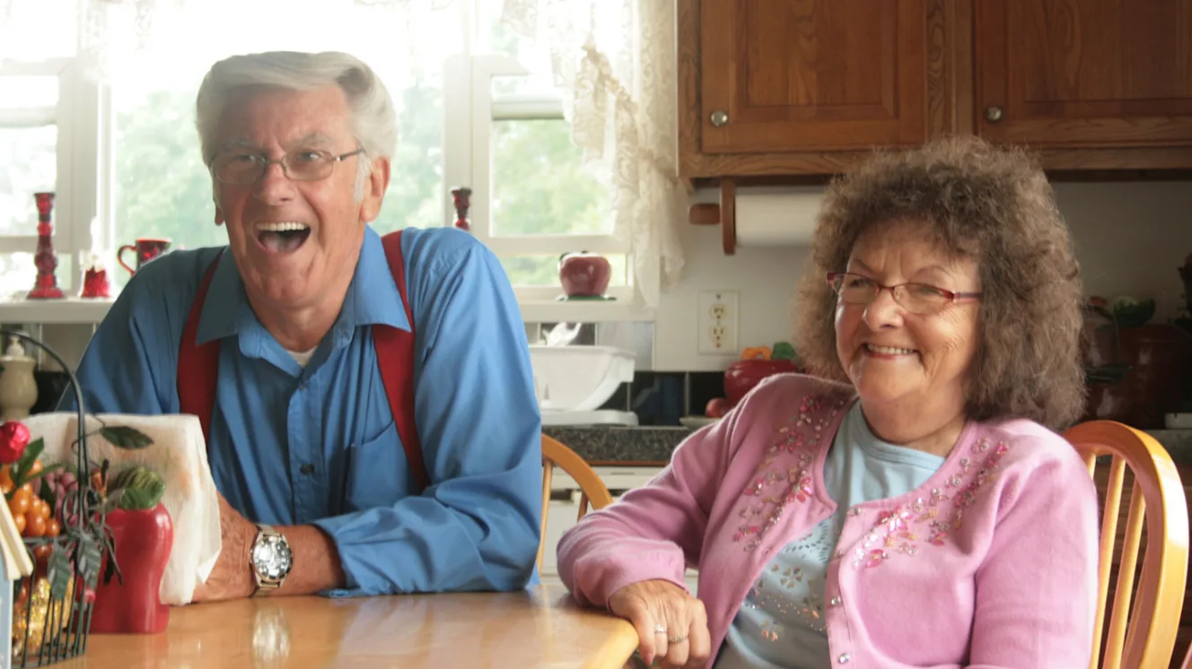 Lee and Lucille Allen in the kitchen of their manufactured home.