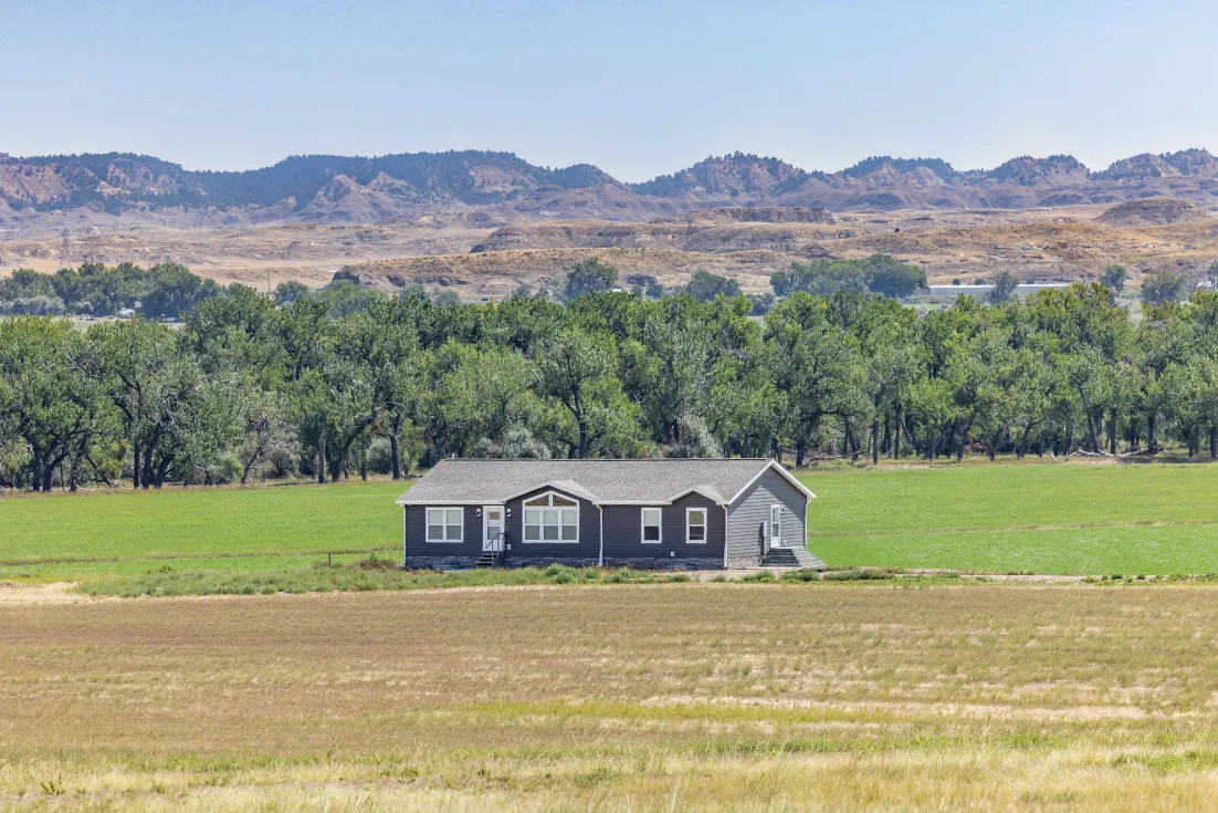 Modern manufactured new construction home on land zoned for placement.