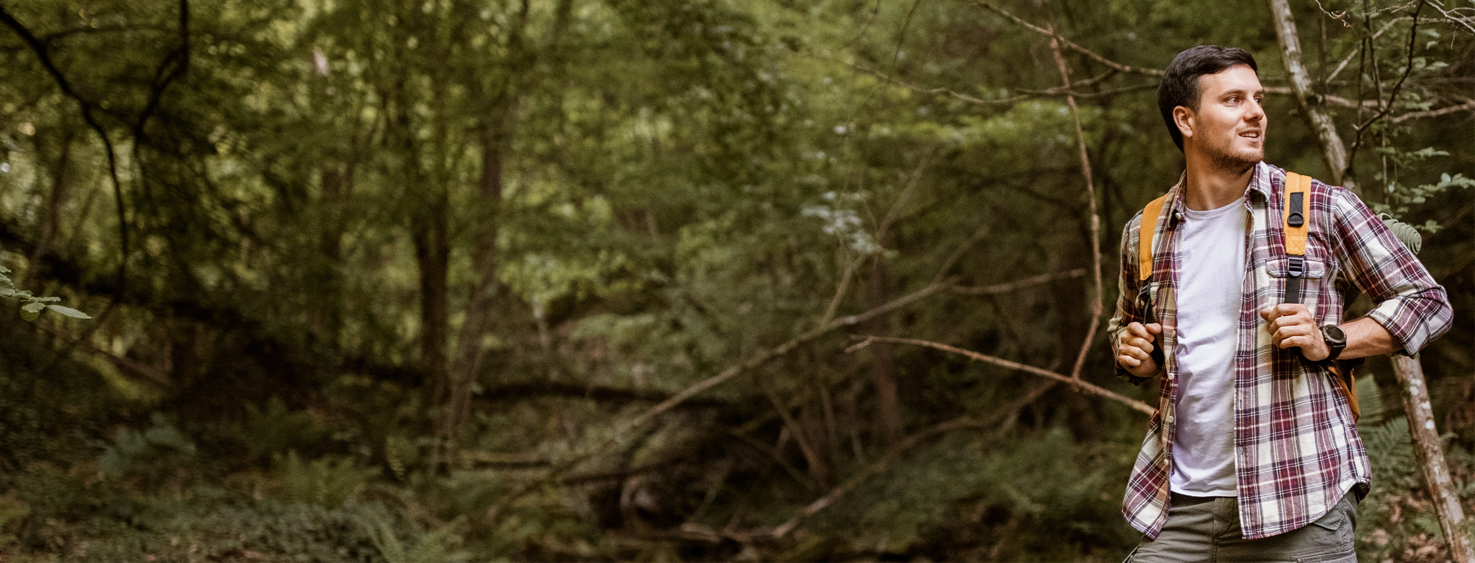 Man hiking in the woods.