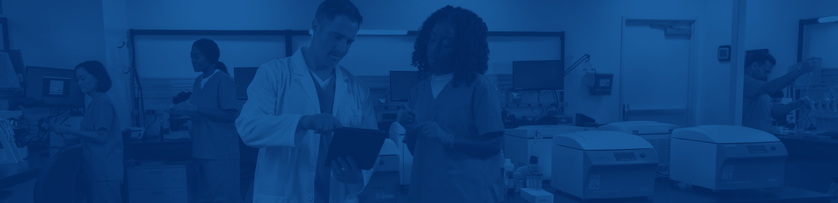 Technicians working in a lab.