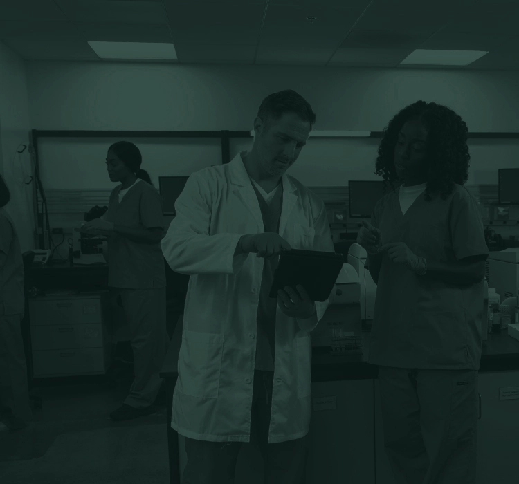 Two technicians working in a lab.