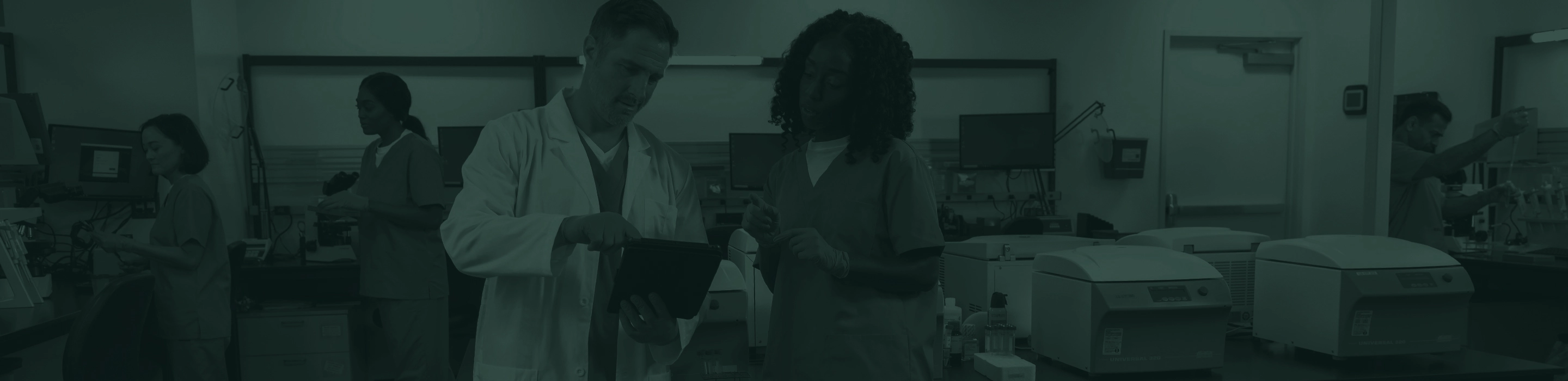 Two technicians working in a lab.