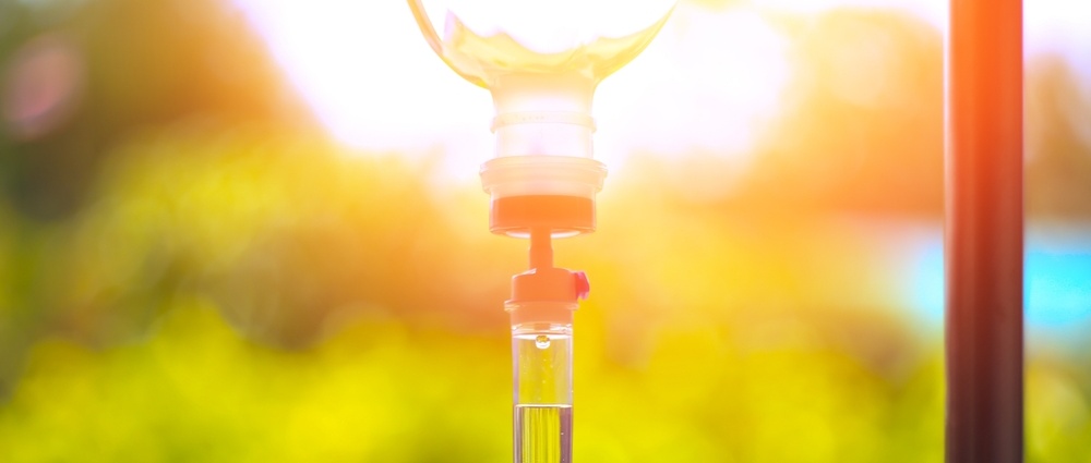 Set vitamin iv fluid intravenous drop saline drip hospital room Medical Concept treatment emergency and injection drug infusion care chemotherapy  concept. blue light background selective focus