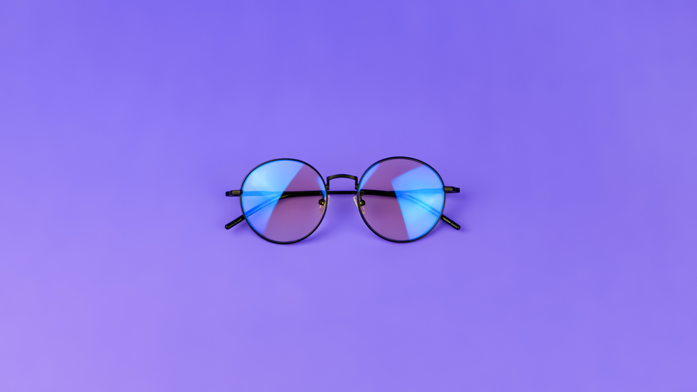 Glasses with a blue light filter to protect the eyes while working at the computer. Round glasses for filtering blue light.