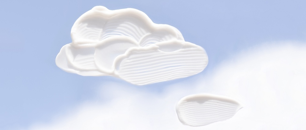 The texture of the cream on the blue sky.