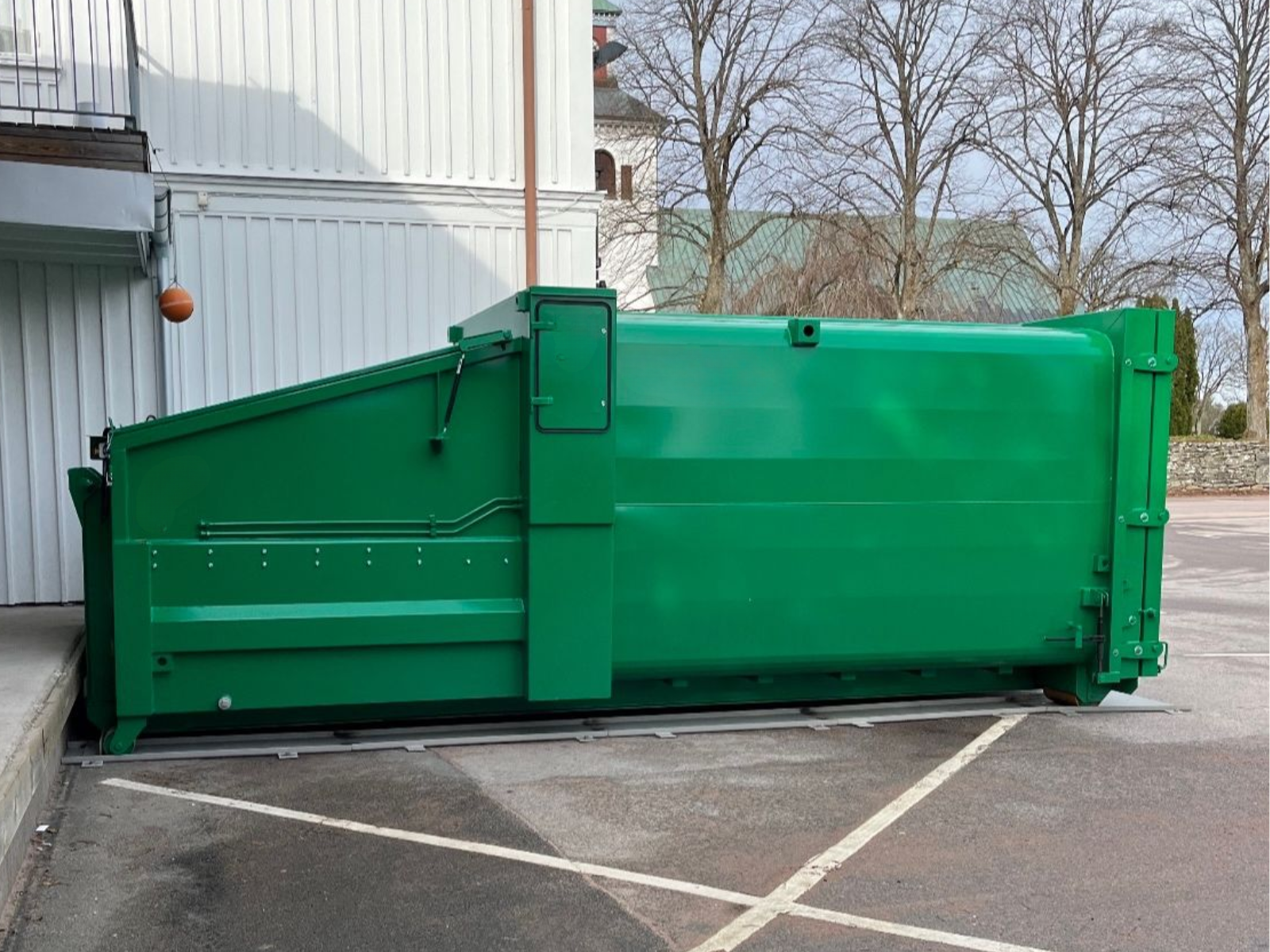 En grön mobil komprimator