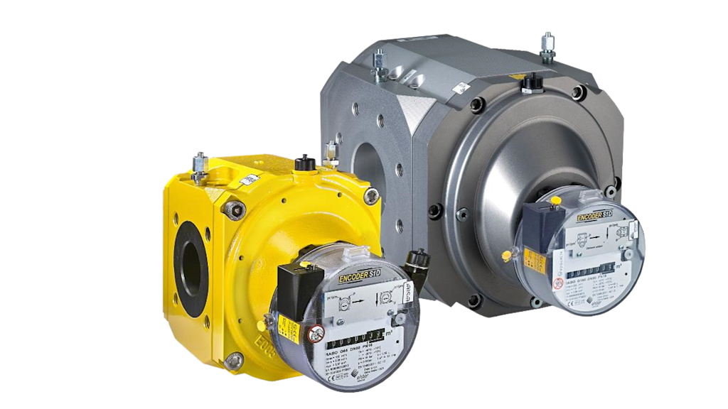 Die Abbildung zeigt einen gelblackierten und einen metallenen Drehkolbengaszähler.